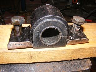 Rover P5 anti roll bushes.These bolt to the chassis and prevent excessive lean on corners.